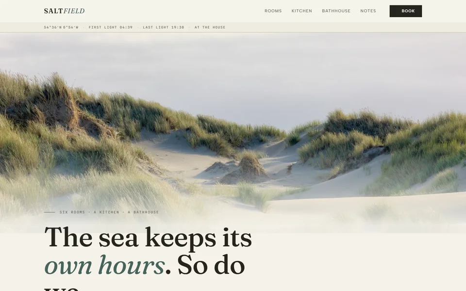 The SALTFIELD homepage: pale dunes under a soft sky above the words &lsquo;The sea keeps its own hours&rsquo; in a warm serif.