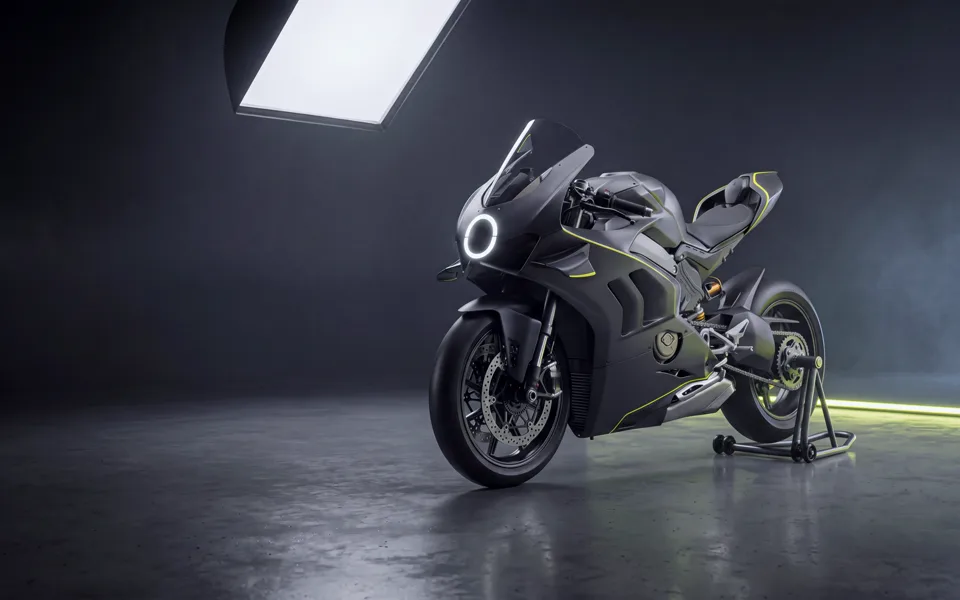The GYRE homepage: a fully faired motorcycle with a glowing ring headlamp standing in a dark studio, beneath the words &lsquo;Only stable in motion&rsquo;.