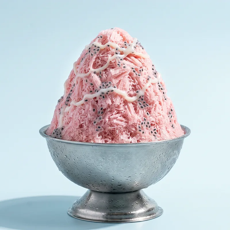 Bandung Monsoon: rose-pink milk snow scattered with translucent basil seeds like rain.
