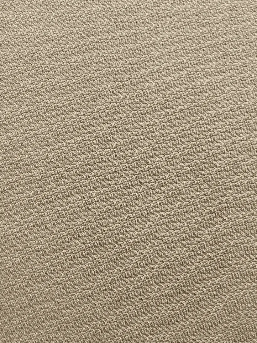 Macro of clay waxed-cotton twill.