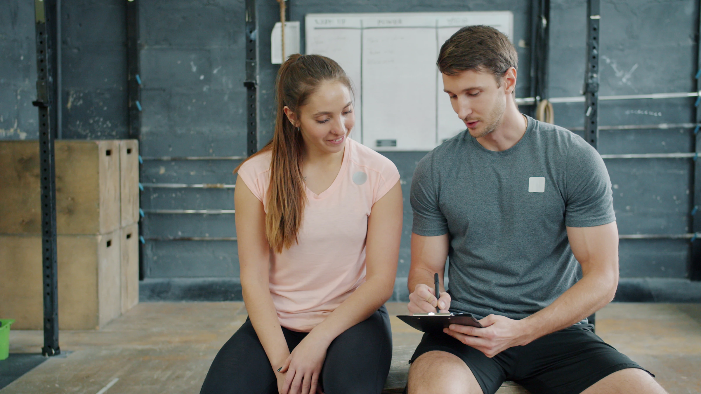 Coach and athlete reviewing a training plan together
